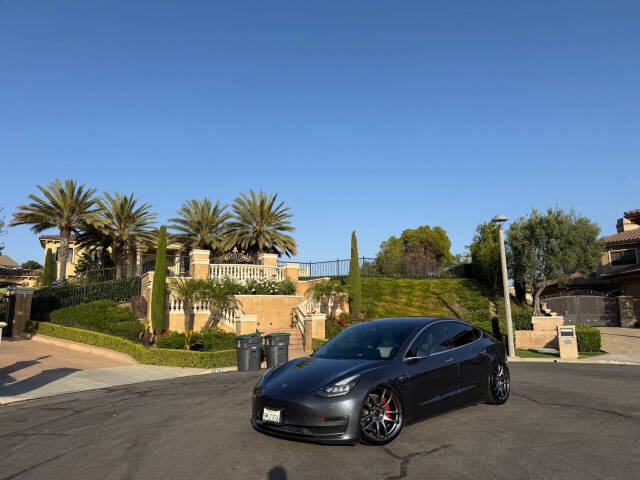 tesla model 3 2018 5YJ3E1EB9JF055189 image tesla model 3 2018 5YJ3E1EB9JF055189 image